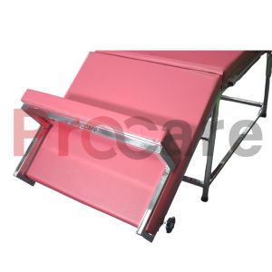 a leg rest of pink colored kangaroo chair